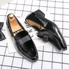 Stylish black dress shoes ideal for any formal occasion.