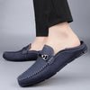 Durable and stylish grey leather loafers with cushioned support.