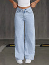 Chic wide-leg denim jeans for women, featuring a button-fly closure and light distressing for stylish everyday wear.