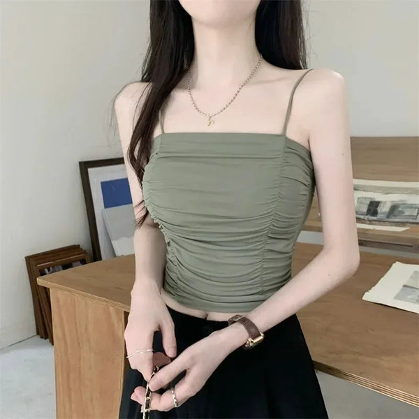 Padded white sleeveless top with customizable suspender straps