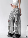 Trendy high-waist wide-leg ripped jeans for women with tie-dye and distressed detailing, perfect for casual street style.