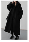 Polished belted trench featuring luxurious fabric and sophisticated design