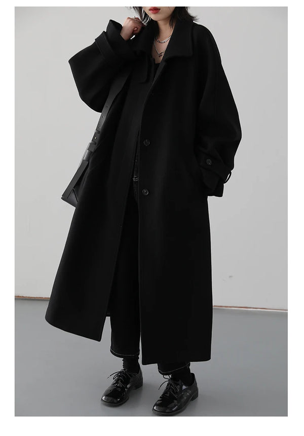 Polished belted trench featuring luxurious fabric and sophisticated design