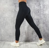 Women's high waist leggings in dark green, perfect for yoga.