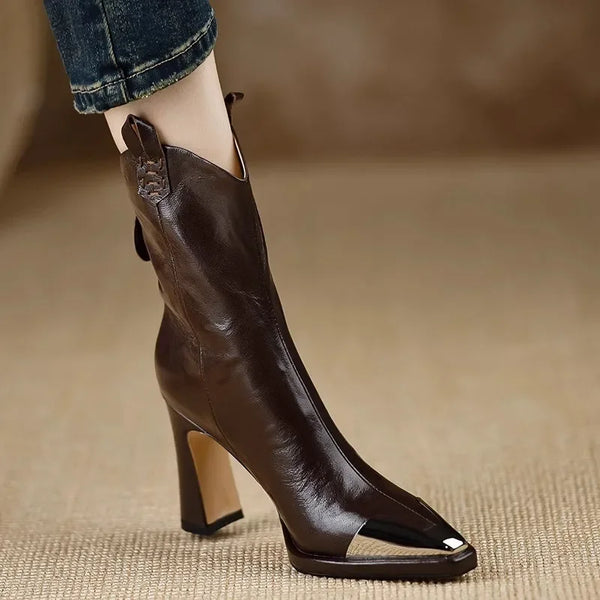 Women's glossy patent leather ankle boots featuring architectural square toe design