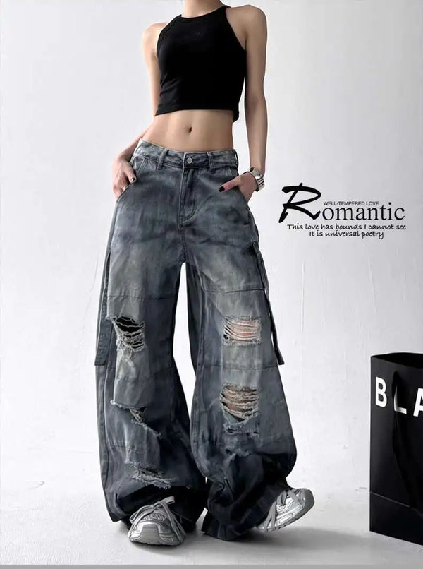 Trendy high-waist wide-leg ripped jeans for women with tie-dye and distressed detailing, perfect for casual street style.