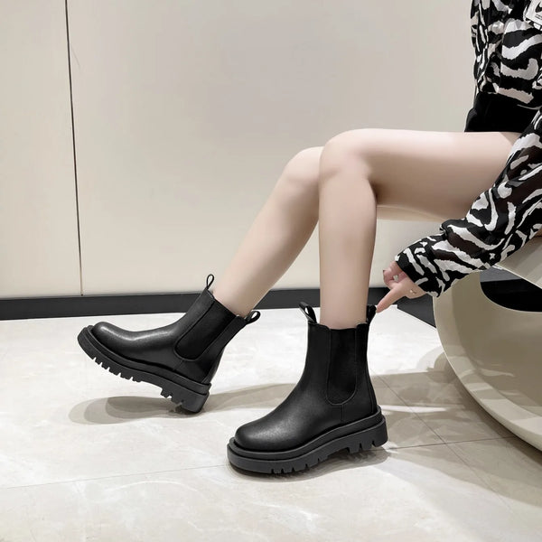 Chic Chelsea boots for women with thick sole, slip-on design, and durable rubber outsole, perfect for casual autumn wear.
