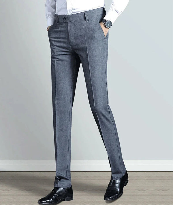 Elegant slim fit men's suit trousers in black, crafted from cotton-polyester blend for comfort and style, perfect for formal