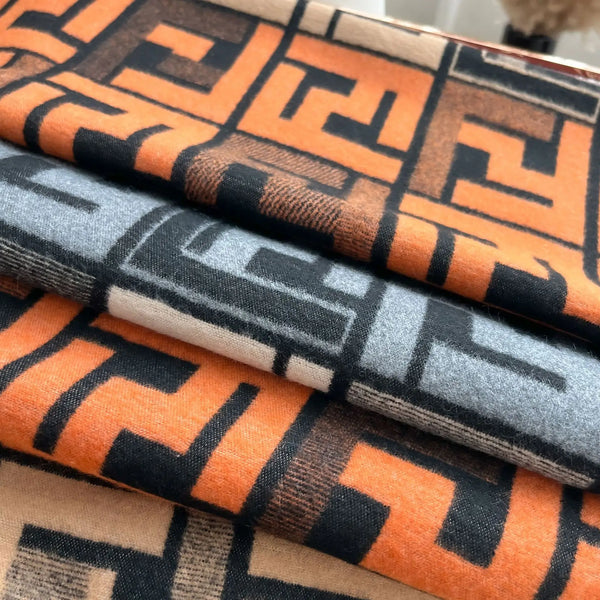 Versatile shawl-style scarf, thick knit for warmth, ideal for autumn and spring.