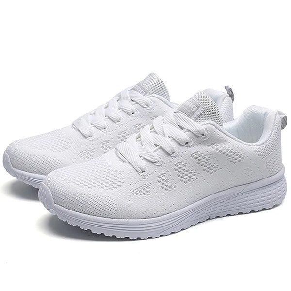 Women's lightweight white sneakers with multi-color trim and rubber sole