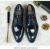 Professional shoes: black leather Oxfords with a refined look.