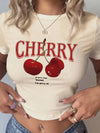 Red cherry pattern cropped tee with short sleeves and stretchy modal knit material