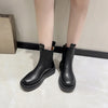 Chic women's Chelsea boots with thick sole, slip-on design, and durable rubber outsole for stylish autumn and spring wear.