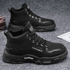 Black suede Winter Vanguard boots with rubber outsole for urban explorers.
