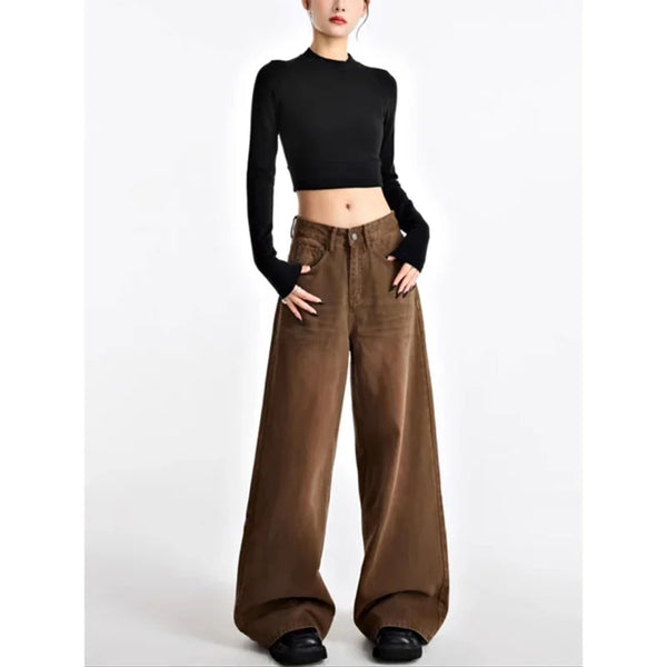 Vintage high-waist wide-leg jeans for women in classic light wash, featuring button-fly closure and retro '90s style.