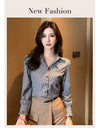 Chic striped blouse for office elegance, featuring a turn-down collar and single-breasted closure, perfect for professional w