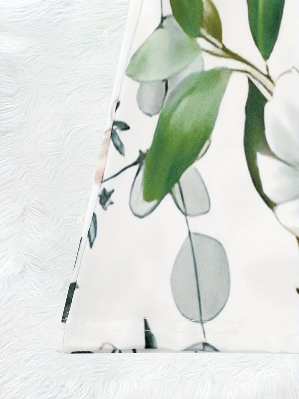 All-season floral maxi dress featuring flattering V-neck, A-line shape, and garden-inspired print