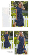 Woman twirling in polka dot pleated midi dress showing movement