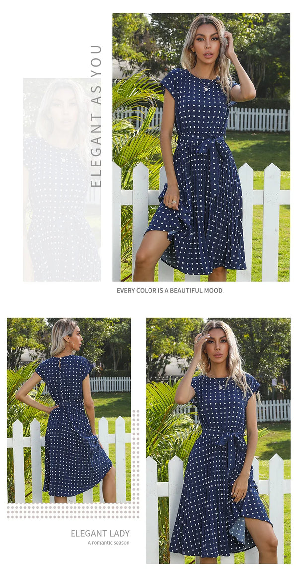 Woman twirling in polka dot pleated midi dress showing movement
