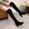 Chic over-the-knee black boots with chunky heels, lace-up detail, and comfortable cotton lining for stylish fall fashion.