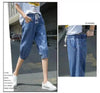 Women's elastic waist harem jeans in comfortable calf-length style
