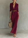 Model posing in the Autumn Whispers dress at an autumn soirée, embodying grace and confidence.