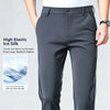 High drape business pants in charcoal creating polished look for evening engagement