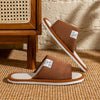Side view of flat heel linen slippers with barefoot-inspired design