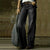 Chic wide leg denim jeans for women in vintage style, featuring mid-rise fit, zipper closure, and functional pockets.