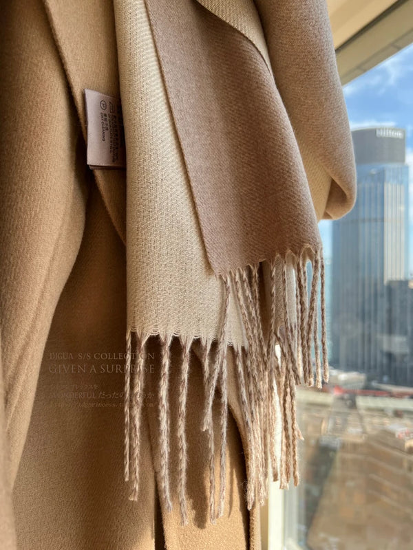 Chic women's scarf in soft teal, ideal for layering and staying warm this winter.