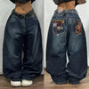 Embroidered denim jeans showcasing urban artistry and style.