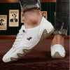Stride Easy men's boots showing detailed stitching, ankle-height design, and sleek casual style