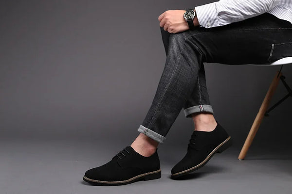 Stylish lace-up dress shoes with a matte finish.