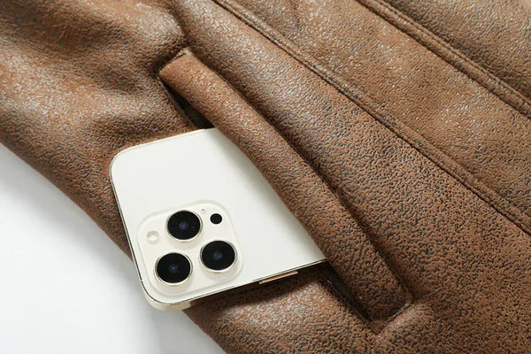 Premium men's suede leather winter jacket with turn-down collar, zipper closure, and regular fit for stylish warmth.