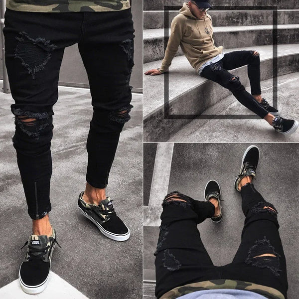 Casual outfit featuring black jeans paired with a graphic tee.