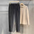 Classic woolen straight-leg trousers in neutral shade