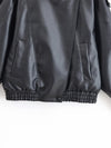 Chic black faux leather moto jacket for women, perfect for autumn evenings and stylish casual wear. Durable and fashionable.