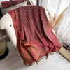 Soft feel of polyester in elegant paisley pashmina shawl.