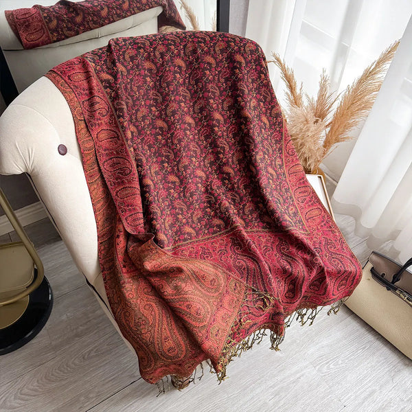 Soft feel of polyester in elegant paisley pashmina shawl.