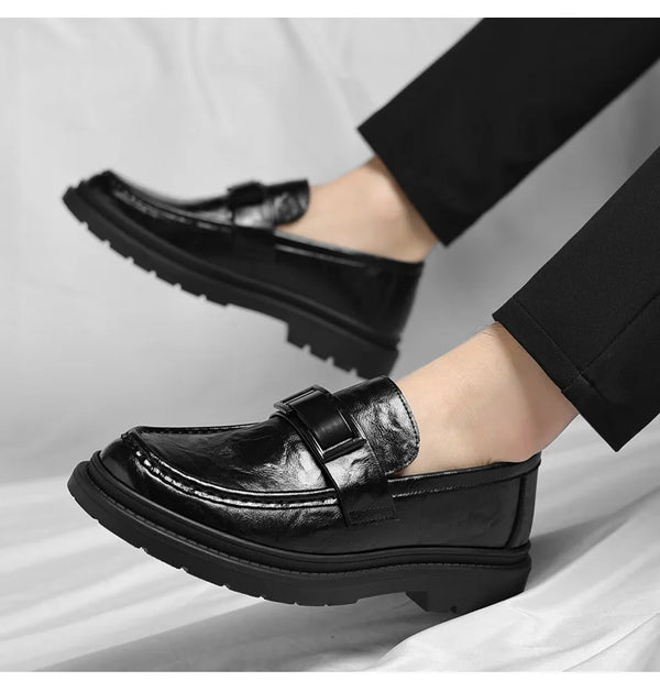 Premium leather slip-on loafers in black, perfect for formal occasions.