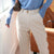 Stretch suit pants with high-waist design and classic button fly for boardroom to evening wear transitions