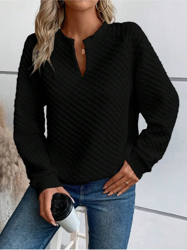 Loose fit knit hoodie with sophisticated deep V-neckline