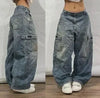Comfortable mid-waist jeans with bold embroidery for casual wear.