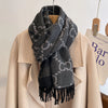Close-up of plush cashmere texture highlighting the premium quality of the shawl.