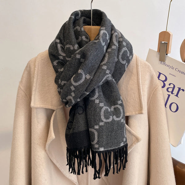 Close-up of plush cashmere texture highlighting the premium quality of the shawl.