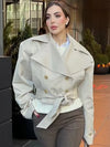 Elegant short-length trench coat with adjustable waist belt