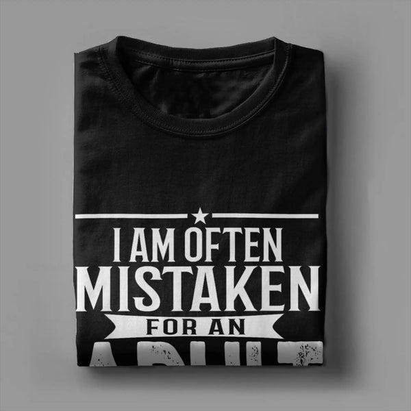 Men's "Mistaken For An Adult" humorous cotton tee with playful print, perfect for casual wear and everyday comfort.
