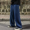 Men's fashion-forward denim jeans with loose straight wide-leg profile