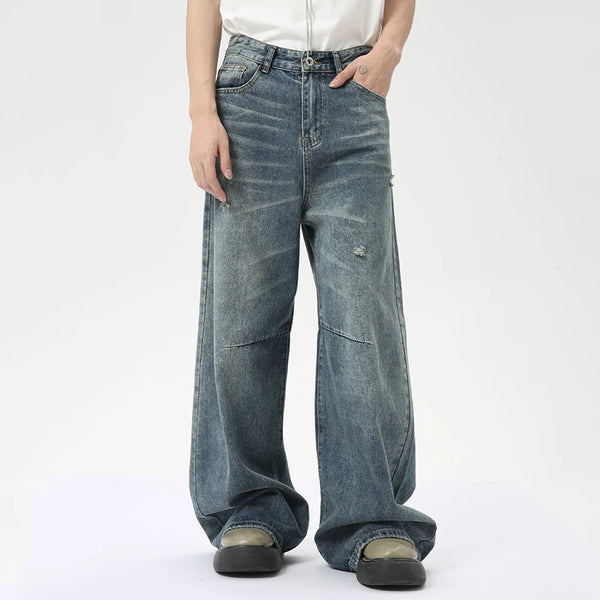 Casual washed blue wide leg jeans for men with comfortable stretch fabric