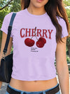 Retro cherry print crop top featuring nostalgic 2000s aesthetic and flattering fitted design